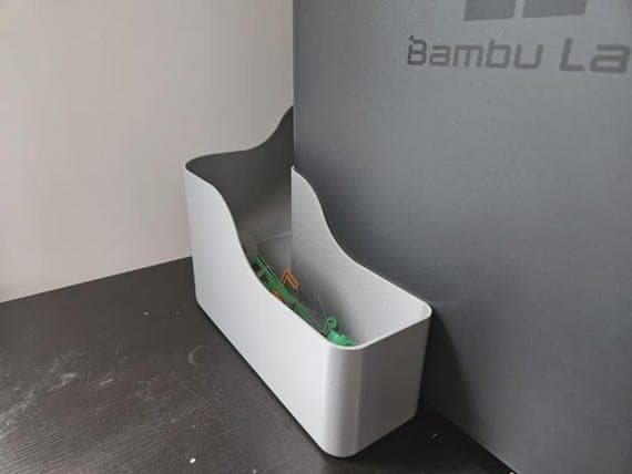 Bambu Lab Filament Poop Chute Wall Mount: 3D Printable Model thumbnail 2